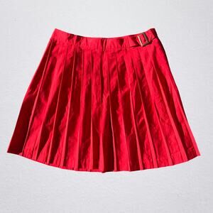 Red pleated mini skirt with buckle detail, preppy indie sleaze schoolgirl
